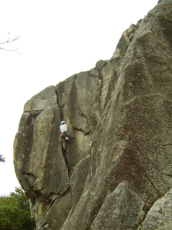Trad the fat leaning crack which was bolted and grade 6c