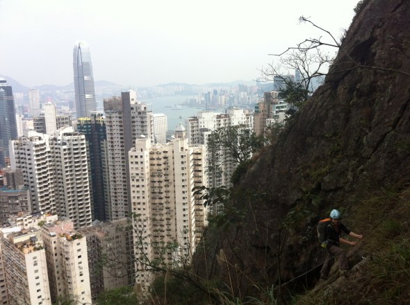 Kelly on the fixed ropes to get to our crag.. 