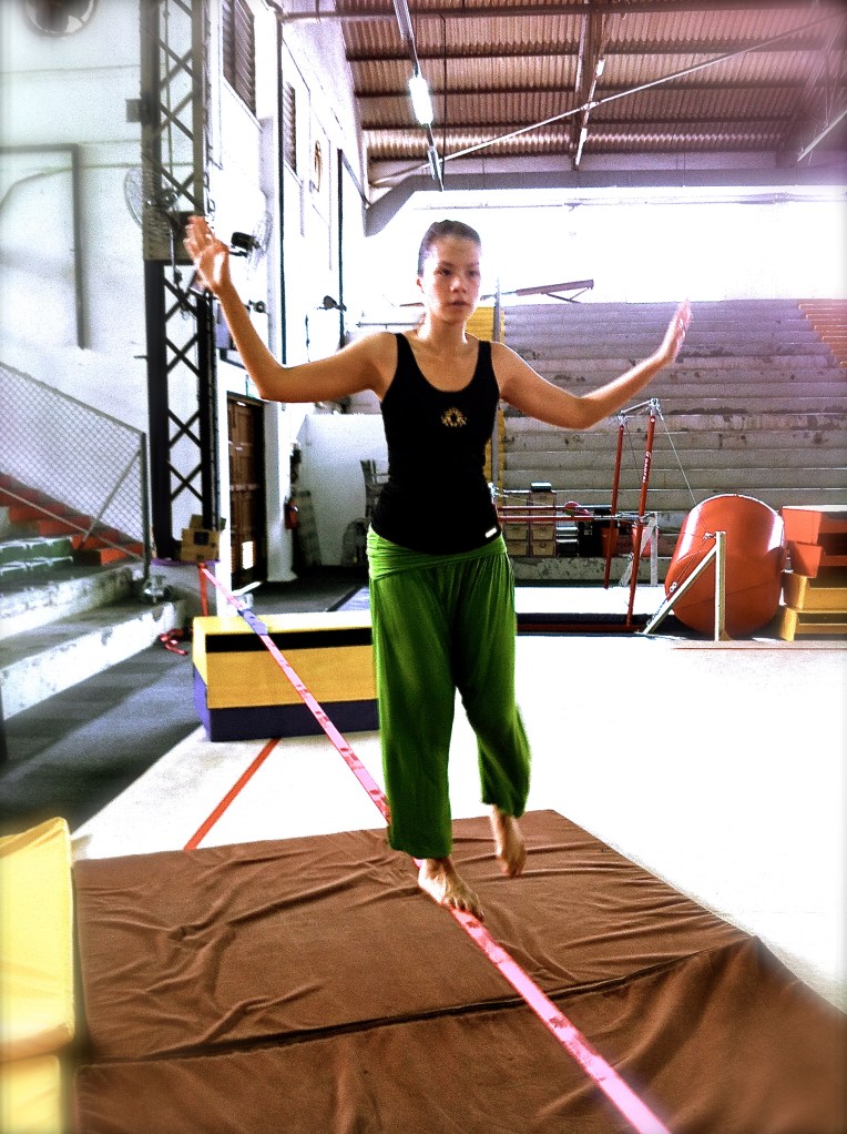 Tracy gracefully 'dancing' on the slackline