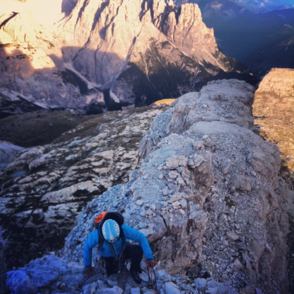 Kelly on the last few moves to the summit