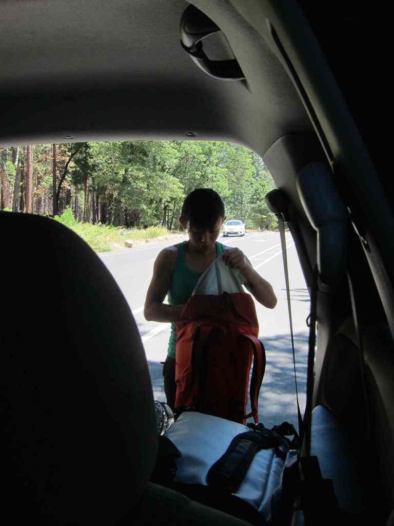 Preparing to hike loads up the wall